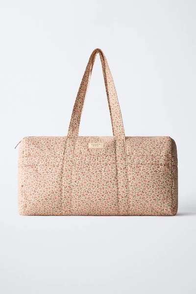 BOWLINGTAS MET BLOEMEN