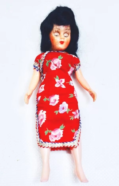 Vintage Plastic Doll in Traditional Costume
