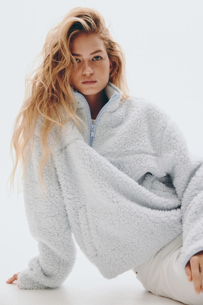 Zip-top teddy sweatshirt - Light blue - Ladies | H&M US