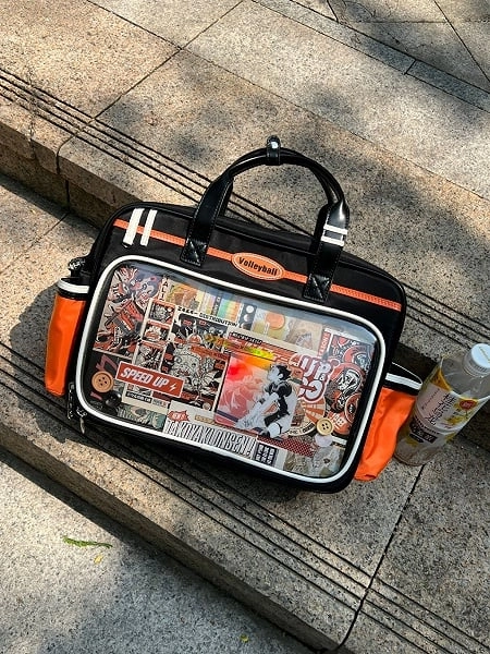 Black & Orange  Ita Bag with Volleyball Design Charm