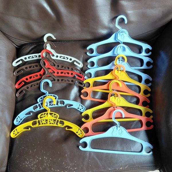 14 vintage childrens clothes hangers, various, 70s/80s