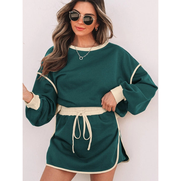 A Set Featuring a Relaxed Pullover in Four Contrasting Colors Paired with Culottes That Have a Tie Waist