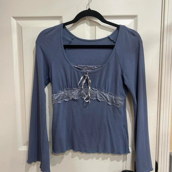 Blue lace long sleeve top with lace trim and tie...