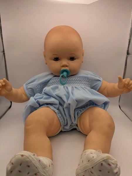 Large baby doll with blue clothes