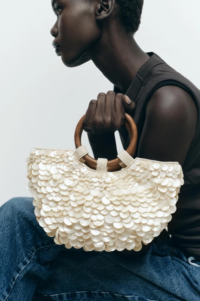 BOLSO APLIQUES EFECTO NACARADO