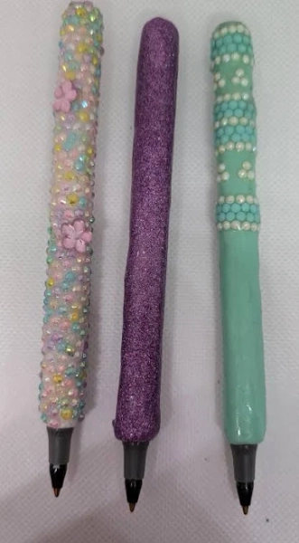 Decorated Bic ballpoint pens Polymer clay, sealed with UV resin Embellished with resin rhinestones / glitter. Buy more - get a discount