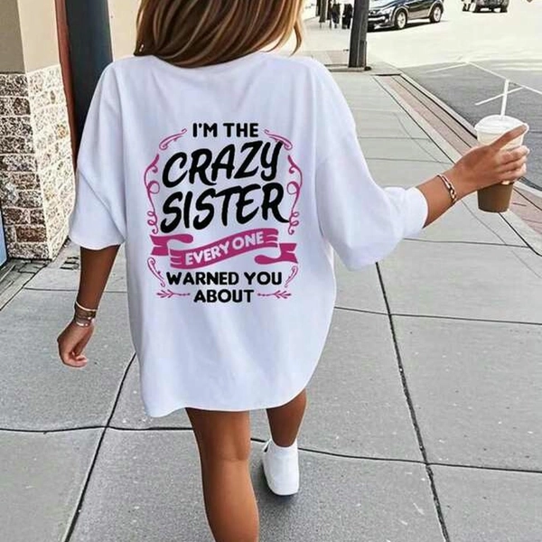 Quirky Graphic Tee for Women - Oversized White 5-14Y T-Shirt Featuring Bold Black and Pink 'I'M THE CRAZY SISTER EVERYONE WARNED YOU ABOUT' Design on the Back | Perfect for Casual Outings and Fun Gatherings, Comfortable and Stylish | only one piece of clothing