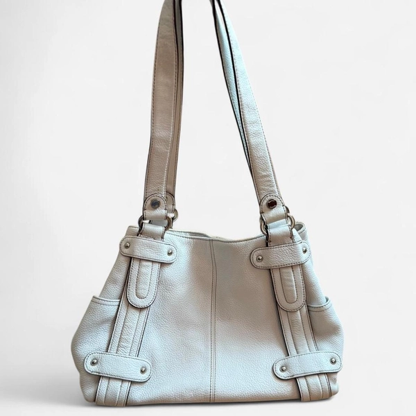 Item: White leather shoulder bag with structured...