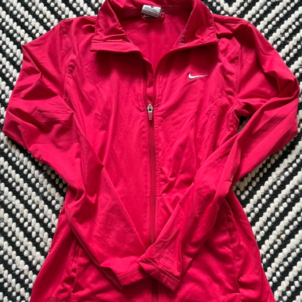 Red Nike zip up jacket/sweatshirt nike
small...