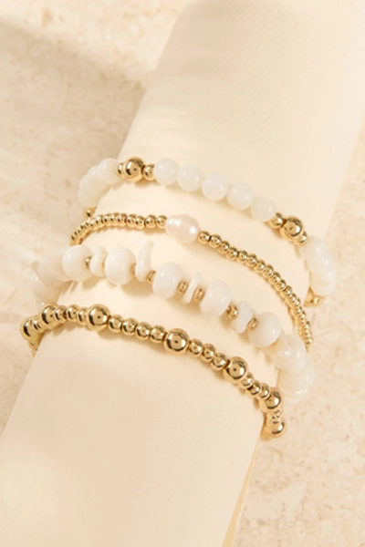 
        Lily Beaded Bracelet in Gold & White | Altar'd State
    