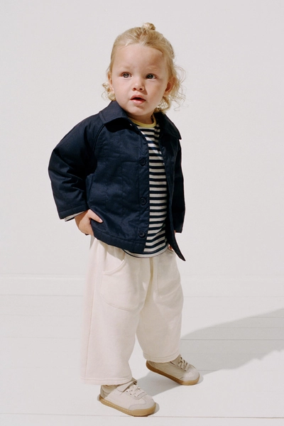 9-12 Months FLEECE BAGGY TROUSERS - Light ecru