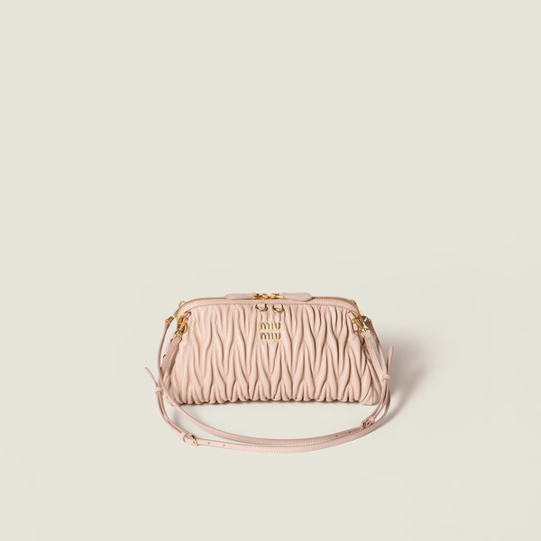 Caprice matelassé nappa leather clutch