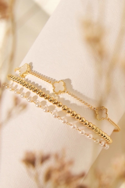 
        Pearl Clover Beaded Bracelet Set in Gold | Altar'd State
    