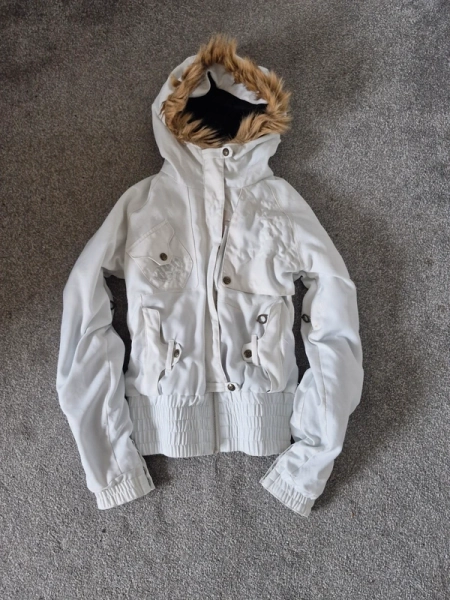 White puffer y2k styled coat with brown fur hood