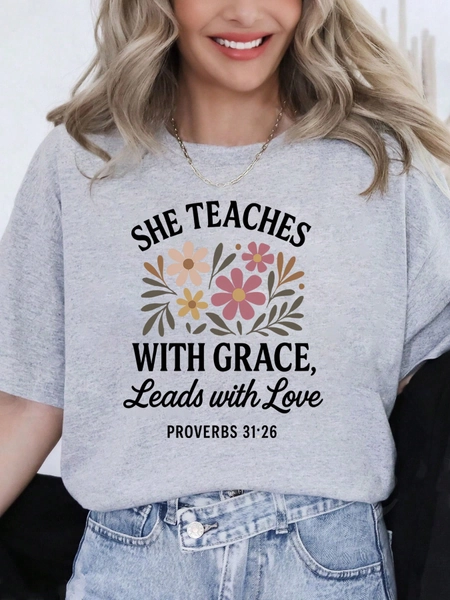Oversized Style For Women, Comfort She Teaches With Grace Leads With Love Tee, Christian Teacher Shirt, Retro Christian Teacher Tee, Teacher Bible Verse Tee, Loose Type Shirt For Women, Perfect For Holiday Parties Or Gift Giving, Soft And Comfortable