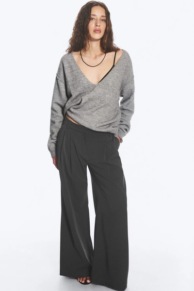 Pantalon de costume plissé taille basse