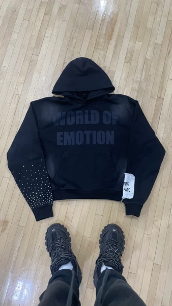 ‘WORLD OF EMOTION’ BLACK ACID WASH RHINESTONE HOODIE