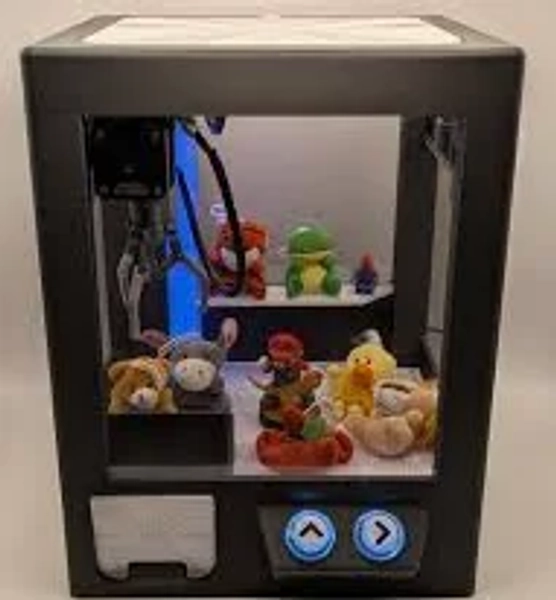 Minicade Mini Claw Machine.