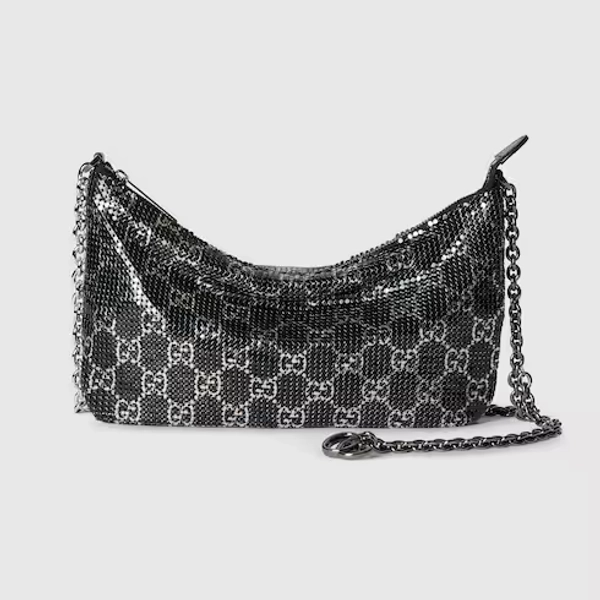 Metallic evening bag with charm
