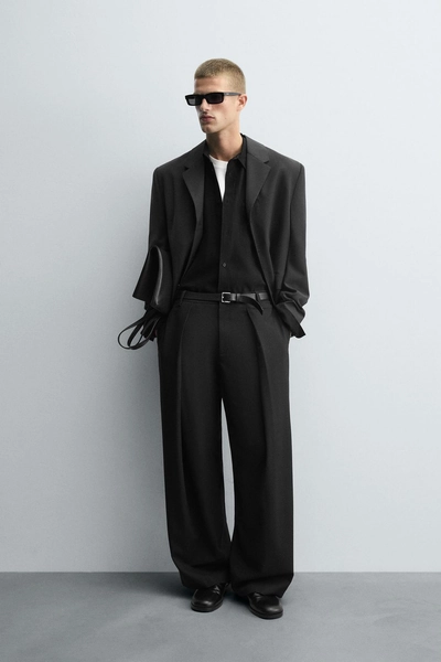 PANTALÓN PLIEGUES RAYA DIPLOMÁTICA