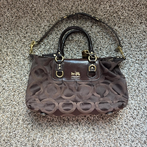 Vintage Brown Coach bag with gold accents, such a...