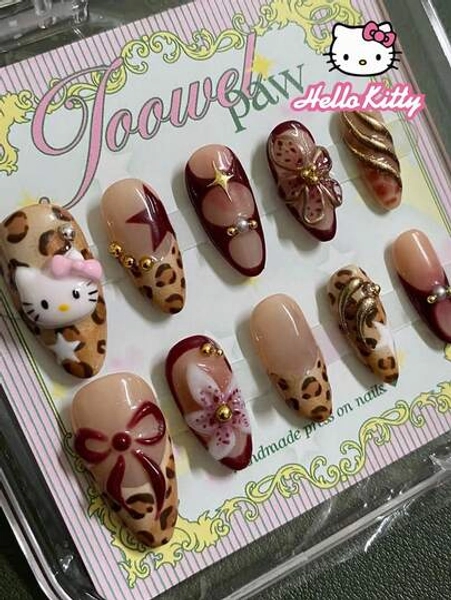 Sanrio Hello Kitty 24pcs Y2K 3D Gel Long Almond Shape Leopard Print French Press-On Nails, Featuring Cute Hello Kitty, Bows And Gel Flower Decor, Gold Beads & Pearls And Gold Gel Line Design, Suitable For Acrylic Fake Nail Set, Includes 1pc Jelly Glue And 1pc Nail File