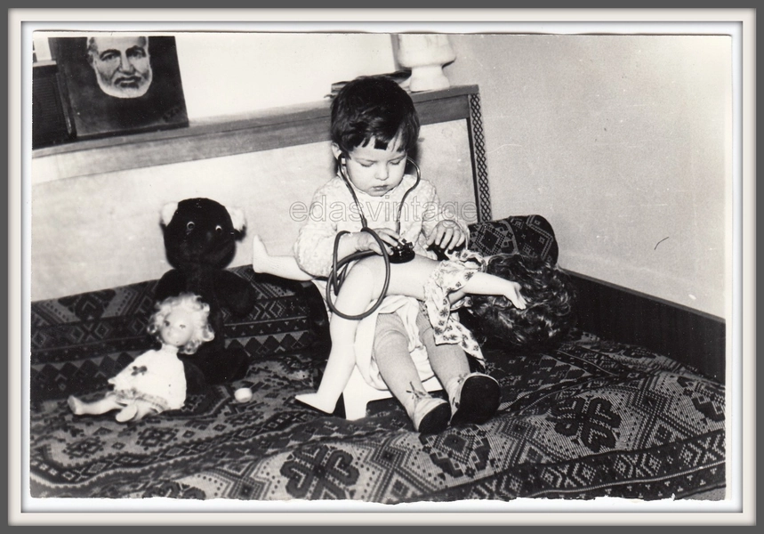 Children hospital play Cute girl Toys Doll Ernest Hemingway Sweet Curious photo