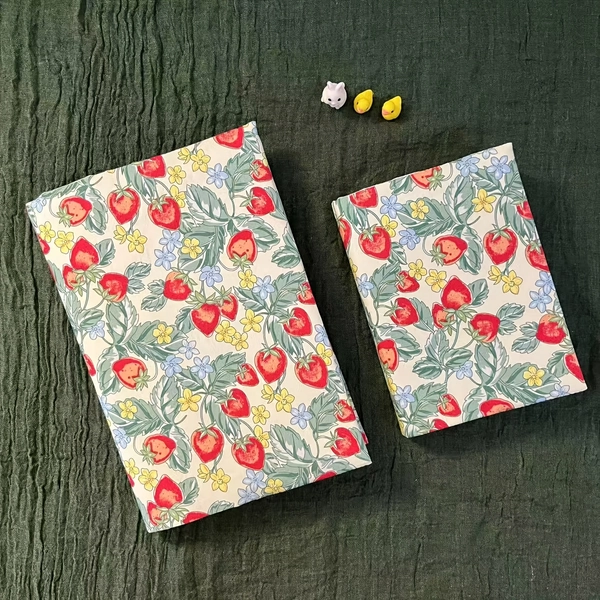 The New A6 And A5 Styles Feature a Fresh Design with a Cute Strawberry Pattern. These Fabric Book Covers Are Handmade And Portable, Perfect for Protecting Notebooks And Planners. They Make an Ideal Gift for Students, Teachers, Office Workers