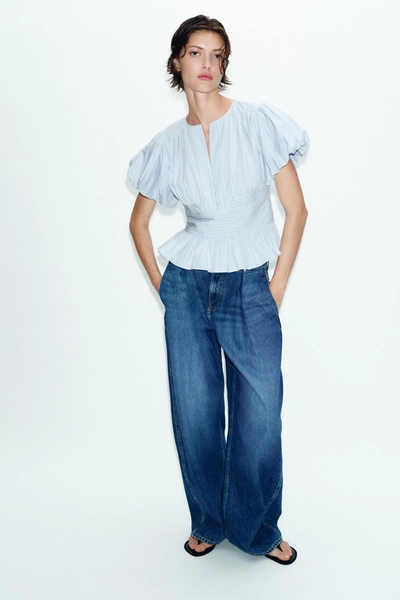 BLUSA JARETAS MANGA ABULLONADA - Celeste | ZARA España