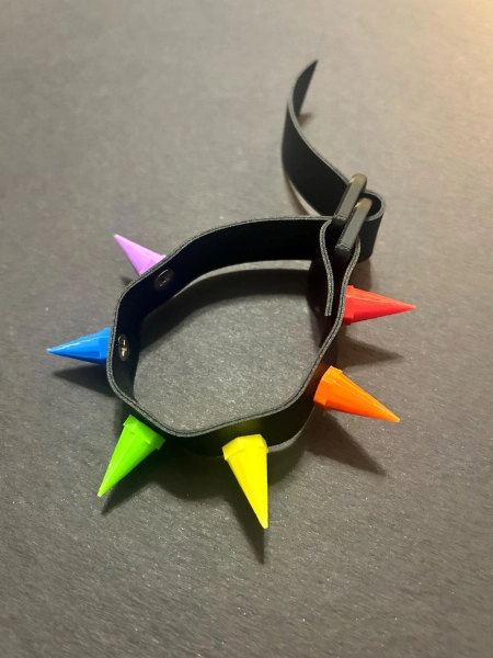 Bracelet with LGBTQ+ inspired spikes.