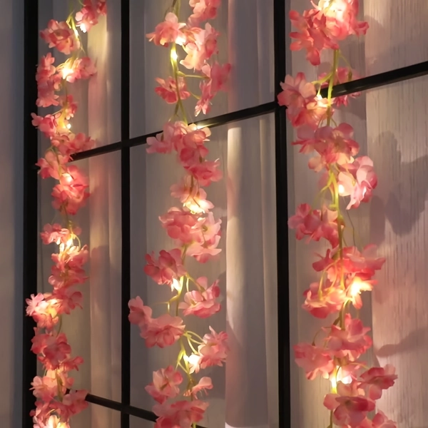 A Beautiful Pink Cherry Blossom String Light, Perfect for Home Decoration. Suitable for Dining Tables, Living Rooms, Bedrooms, Walls, And More. It Emits Warm White Light, Ideal for Decorating Scenes Like Weddings, Birthdays, And Dates