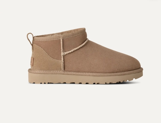 UGG® Women's Classic Ultra Mini Sheepskin Classic Boots in Sand