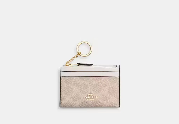 Mini Skinny Id Case In Signature Canvas