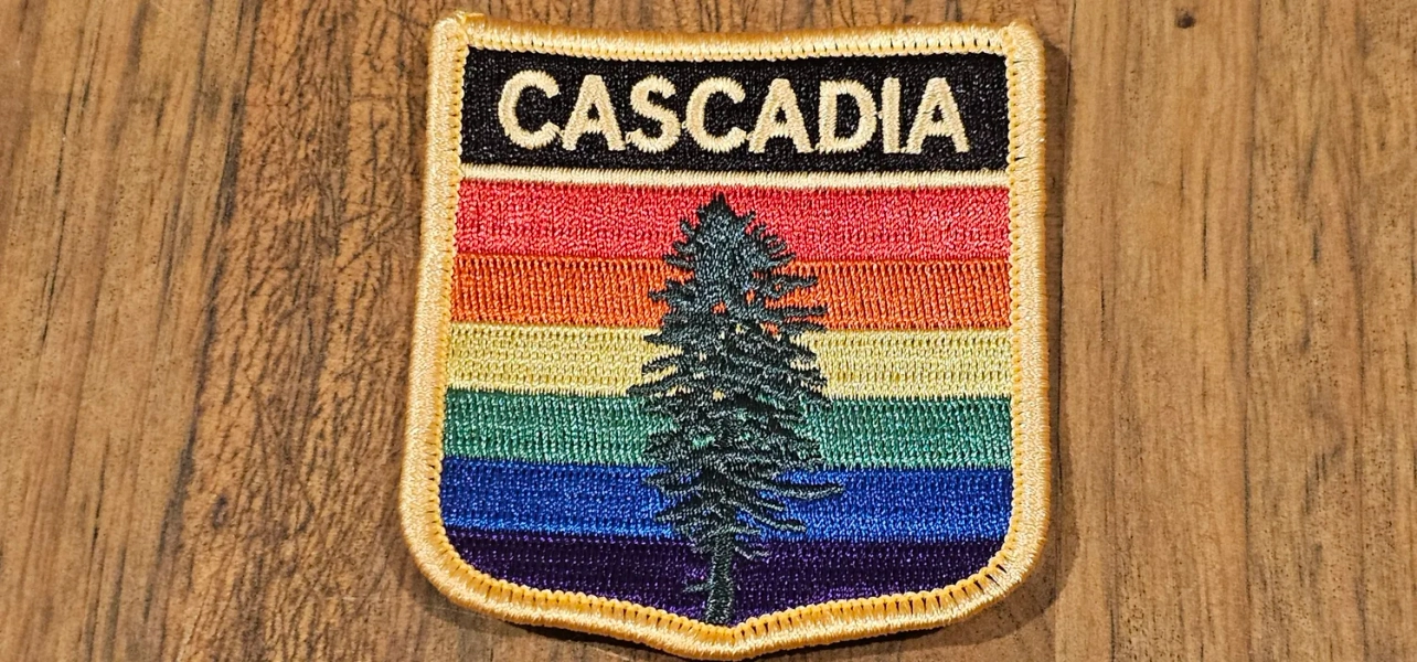 Pride Cascadia Shield iron on patch — Cascadia Department of Bioregion