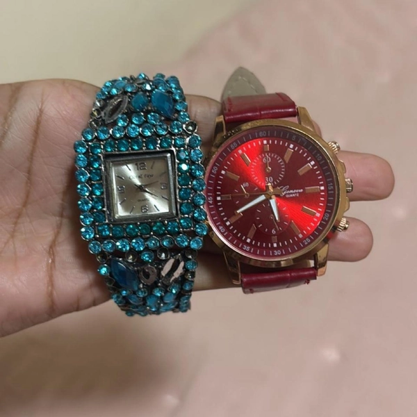 Vintage Red and gold watch with red face and gold...