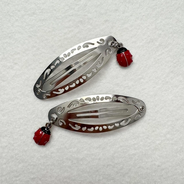 silver hair clip with red ladybug charm🐞✨

brand...