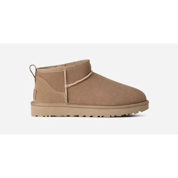 UGG® Women's Classic Ultra Mini Sheepskin Classic Boots in Sand, Size 9