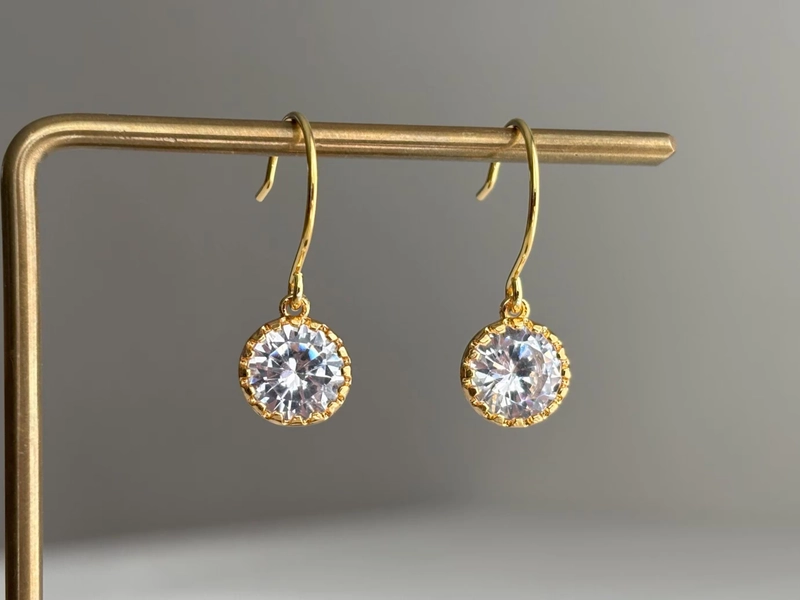 Clear round zircon earrings with oversized gold plated over silver ear wires