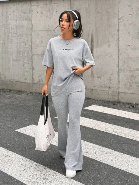 SHEIN Women's Letter Print Drop Shoulder Tee and Flare Pants Set