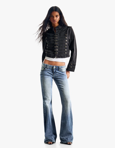 Low-rise embroidered flared jeans