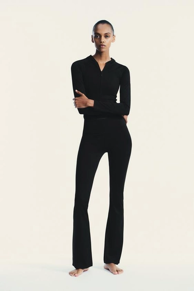 SEAMLESS POLYAMIDE FLARE TROUSERS