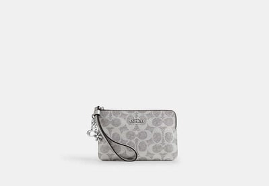 Boxed Corner Zip Wristlet In Signature Canvas With Charms