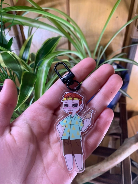 Double Sided Postal Brain Damaged Dude Keychain Preorder