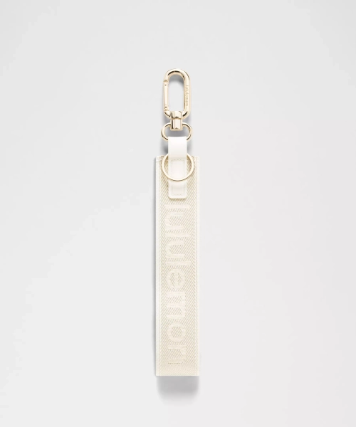 Never Lost Keychain *Metallic Wordmark - Light Ivory - ONE SIZE